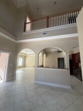 10998 Goodwin St, Unit A in Bonita Springs, FL - Foto de edificio - Building Photo