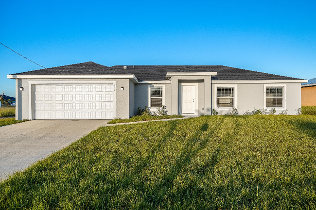 634 NE Juanita Pl in Cape Coral, FL - Building Photo - Building Photo