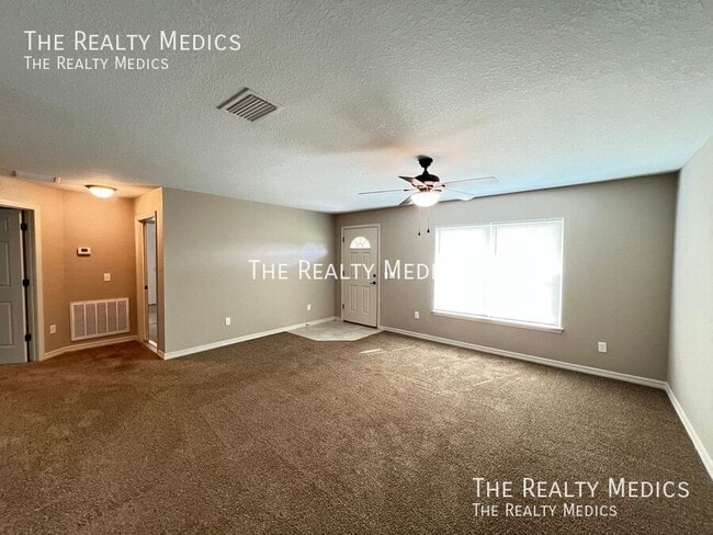 162 Malauka Run in Ocklawaha, FL - Building Photo - Building Photo