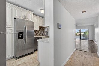 9670 W McNab Rd in Tamarac, FL - Building Photo - Building Photo