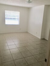 438 Village Ct, Unit 438 in Minneola, FL - Foto de edificio - Building Photo