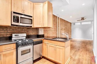 277 E 10th St in New York, NY - Building Photo - Building Photo