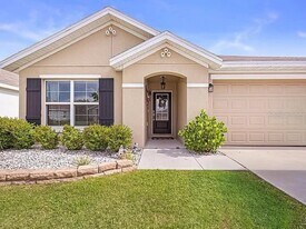 8574 Triumph Cir in Wildwood, FL - Building Photo