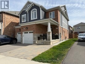1269 Rose Way in Milton, ON - Building Photo