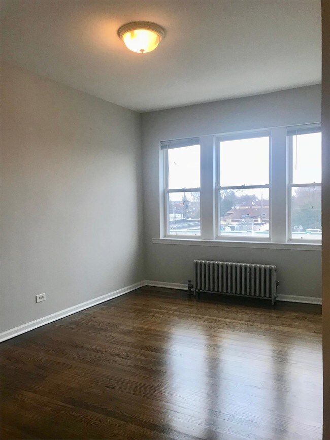 7153 W Grand Ave-Unit -202 in Chicago, IL - Building Photo - Building Photo