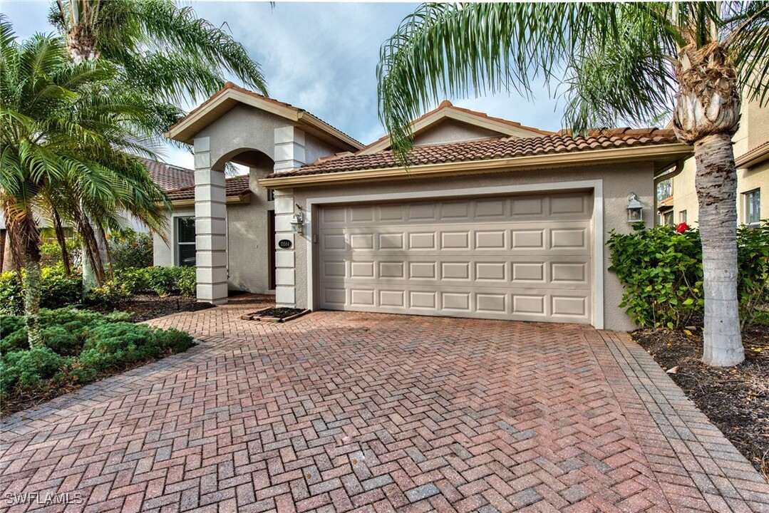 13584 Troia Dr in Estero, FL - Building Photo