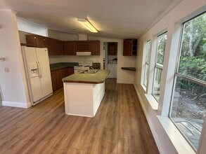 12002 SW Sandalfoot Blvd in Boca Raton, FL - Foto de edificio - Building Photo