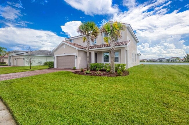 7609 NW Archerfield Dr in Port St. Lucie, FL - Foto de edificio - Building Photo