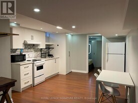 157 Rouge River Dr in Toronto, ON - Building Photo