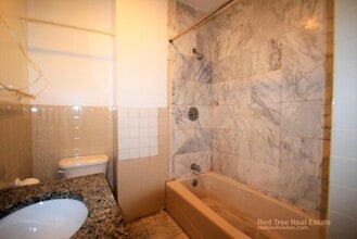 74 Mozart St, Unit 2 in Boston, MA - Foto de edificio - Building Photo