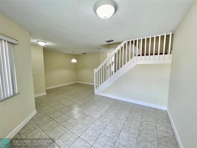 property at 20870 NW 2nd St