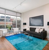 Living Room - Luxe on Madison Apartments in Chicago, Illinois
