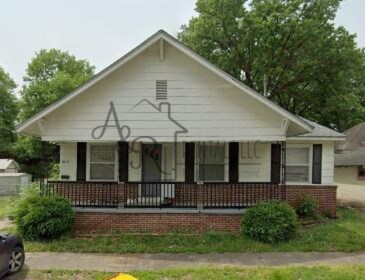 302 E Kansas St in Pittsburg, KS - Foto de edificio
