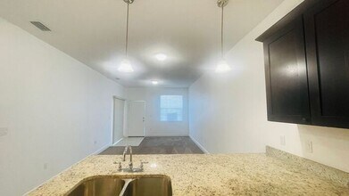 1595 Cumin Dr in Poinciana, FL - Building Photo - Building Photo