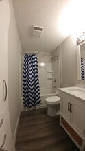 2204 Valleyhigh Dr NW, Unit D103 in Rochester, MN - Building Photo - Building Photo