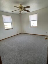 3015 Harmony Ln, Unit Apt 104 in Muscatine, IA - Building Photo - Building Photo