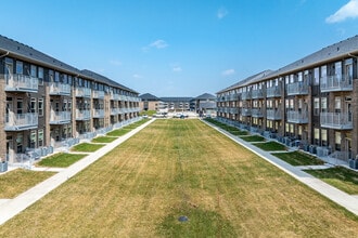 Brick Towne at Kettlestone in Waukee, IA - Foto de edificio - Building Photo