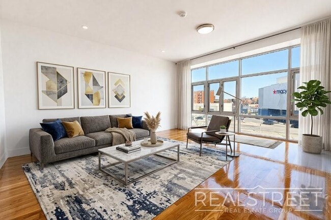 property at 90-02 Queens Blvd