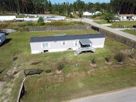 239 Road 5027 Rd in Cleveland, TX - Building Photo