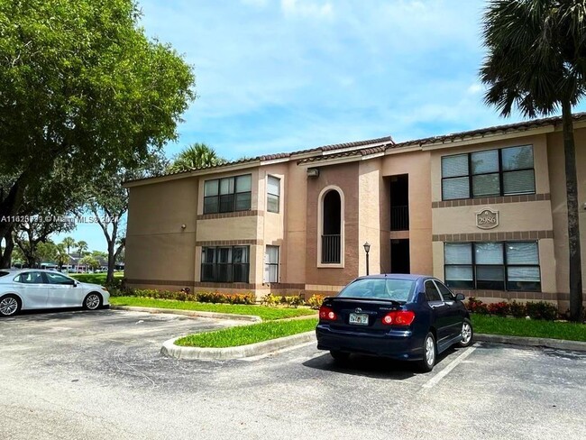 2986 S University Dr, Unit 105 in Davie, FL - Foto de edificio - Building Photo