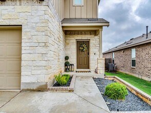 624 Pepperbark Loop in Mustang Ridge, TX - Building Photo - Building Photo
