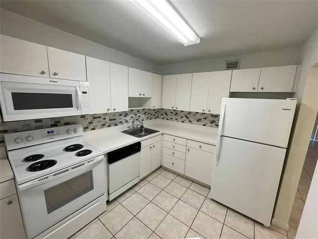 property at 7440 Miami Lakes Dr