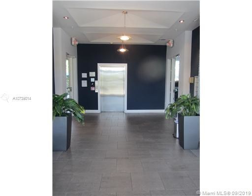 1789 NE Miami Gardens Dr-Unit -W203 in North Miami Beach, FL - Building Photo - Building Photo