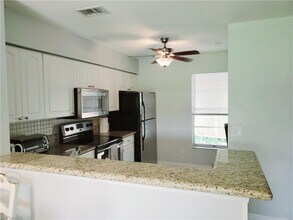 25484 Cockleshell Dr-Unit -905 in Bonita Springs, FL - Building Photo - Building Photo