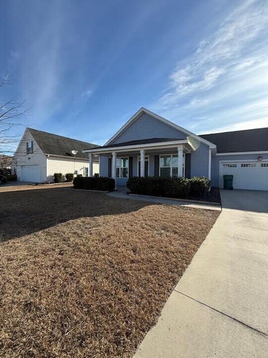 7437 Courtney Pines Rd in Wilmington, NC - Building Photo