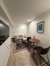 128 Poplar St, Unit GL in Jersey City, NJ - Foto de edificio - Building Photo