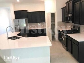 15126 Arlington Park Ave in Mont Belvieu, TX - Building Photo - Building Photo