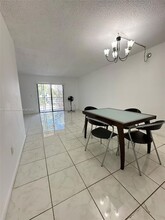 861 NE 209th Terrace, Unit 24-203 in Miami, FL - Building Photo - Building Photo