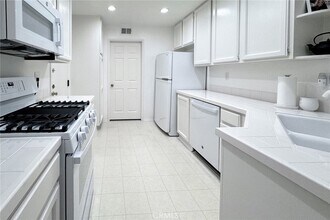 19 Brittany, Unit 10 in Newport Beach, CA - Building Photo - Building Photo