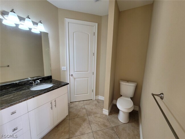 704 Magnolia Ave in Lehigh Acres, FL - Building Photo - Building Photo