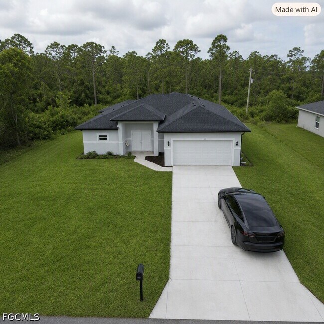 property at 1103 W 10th St