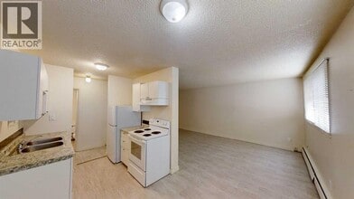 9515-9100 100 Ave. in Grande Prairie, AB - Building Photo - Building Photo