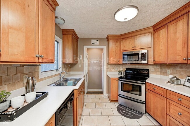 property at 6115 Indianola Ave