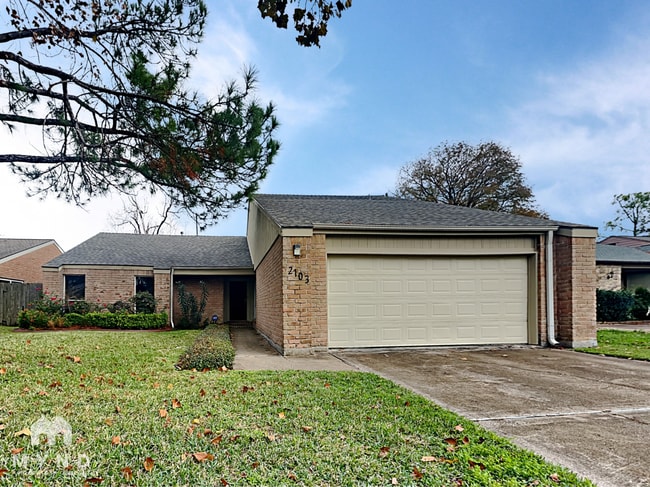 property at 2103 Woodland Springs St