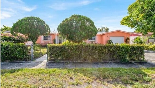 property at 3030 NW 212th St