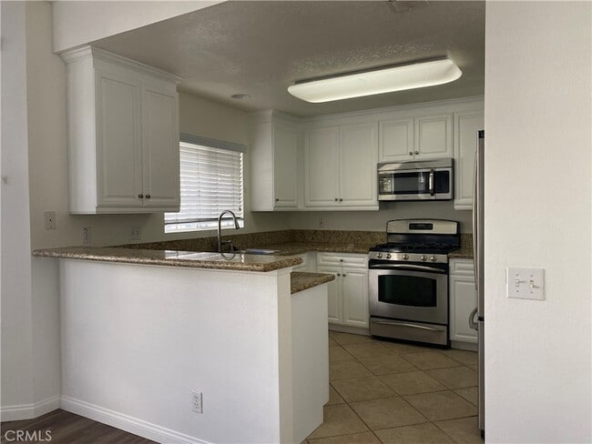 23412 Pacific Park Dr, Unit 10H in Aliso Viejo, CA - Building Photo - Building Photo