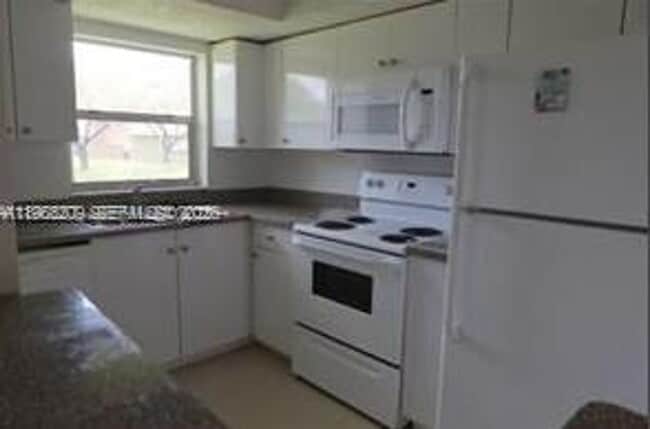 property at 2021 NW 59th Terrace