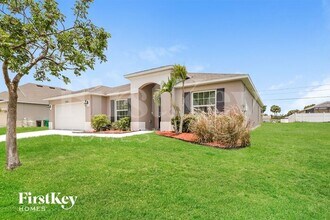 1061 SW Du Bois Ave in Port St. Lucie, FL - Building Photo - Building Photo
