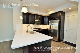 14043 Sunrise Valley Dr in Herndon, VA - Building Photo - Building Photo