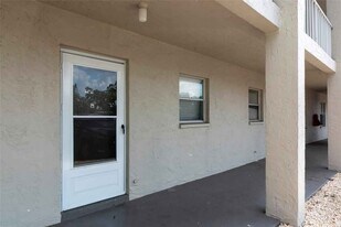 3072 Lake Bayshore Dr, Unit Bayshore on the Lake Condo in Bradenton, FL - Building Photo