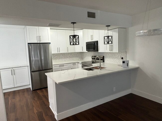 property at 7690 Tahiti Ln