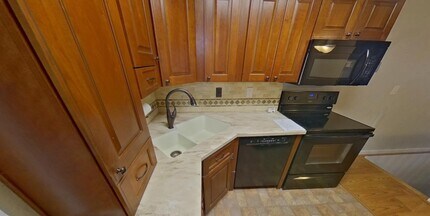 1885 S Quebec Way, Unit E16 in Denver, CO - Building Photo - Building Photo