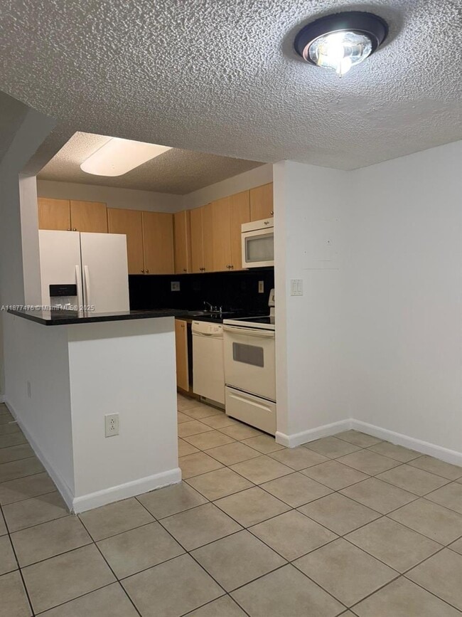 property at 7160 NW 179th St