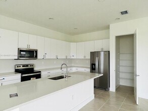 5032 Frattina St. in Ave Maria, FL - Foto de edificio - Building Photo