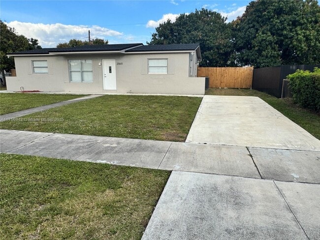 property at 20611 NW 23rd Ct