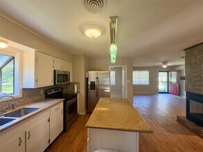 101 Pine Shadows Ln in Coldspring, TX - Building Photo - Building Photo